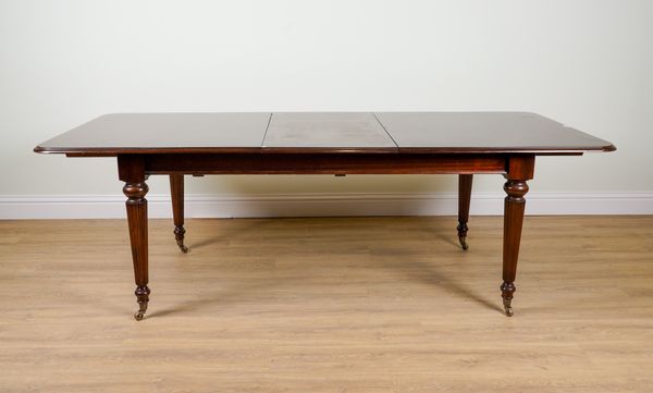 A VICTORIAN STYLE MAHOGANY EXTENDING DINING TABLE