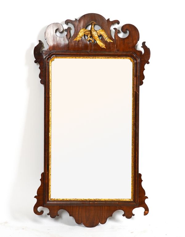 A GEORGE III PARCEL GILT FRET CUT MIRROR (2)