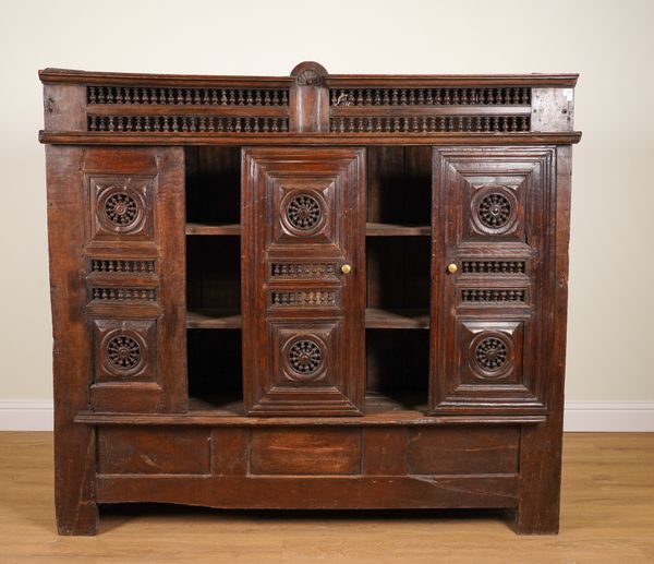 AN 18TH CENTURY AND LATER OAK BRETON CUPBOARD