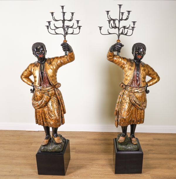 A PAIR OF 20TH CENTURY POLYCHROME PAINTED BLACKAMOOR FIGURAL CANDELABRA (2)