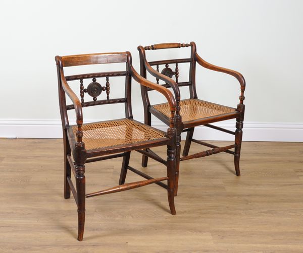 A NEAR PAIR OF REGENCY FAUX ROSEWOOD PAINTED OPEN ARMCHAIRS (2)