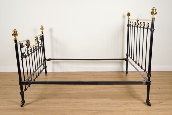 AN ART NOVEAU BLACK PAINTED BRASS MOUNTED DOUBLE BED