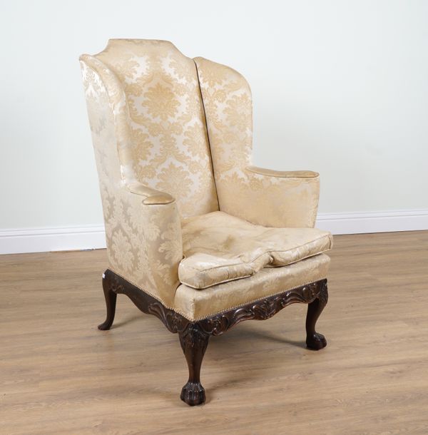 A 19TH CENTURY QUEEN ANNE STYLE HIGH WINGBACK ARMCHAIR