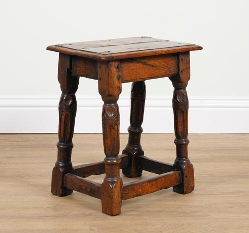 A 17TH CENTURY AND LATER OAK JOINT STOOL
