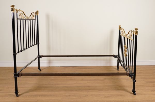 AN ART NOVEAU BLACK PAINTED BRASS MOUNTED DOUBLE BED