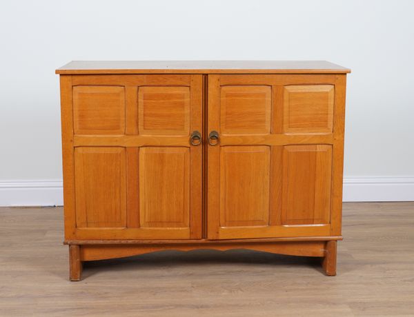 HEALS; A MODERN OAK TWO DOOR SIDE CUPBOARD