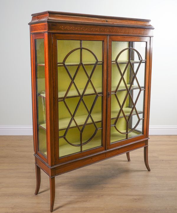 AN EDWARDIAN MAHOGANY INLAID TWO DOOR DISPLAY CABINET