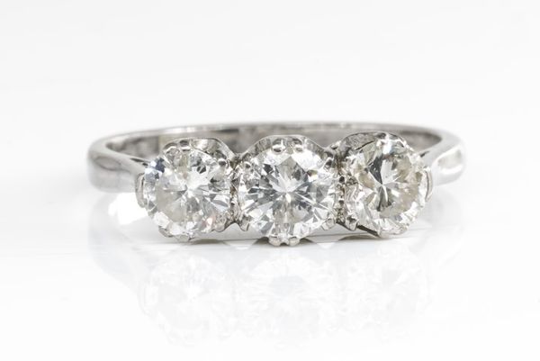 A DIAMOND THREE STONE RING