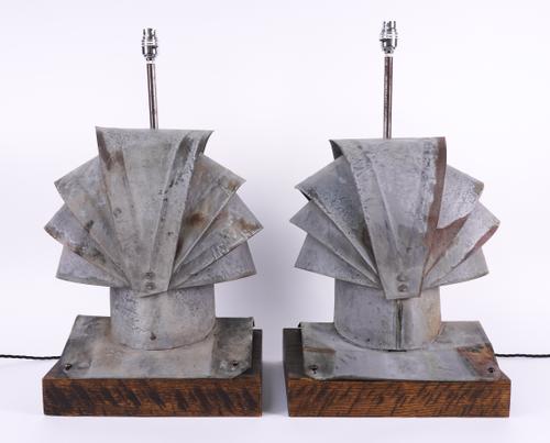 A PAIR OF ZINC CHINMEY COWLS LATER ADAPTED AS TABLE LIGHTS (2)