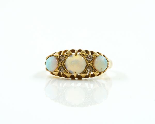 A GOLD, OPAL AND DIAMOND RING