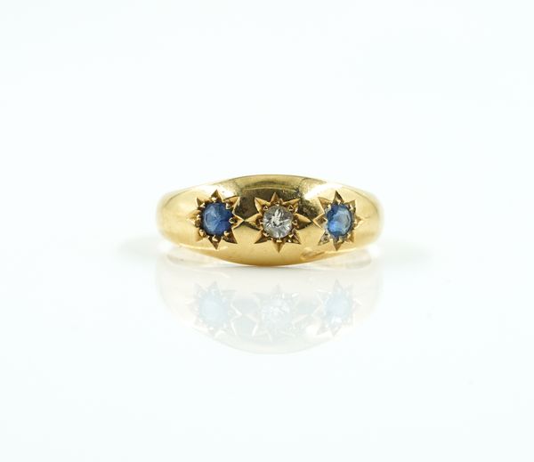 A SAPPHIRE AND DIAMOND GYPSY RING