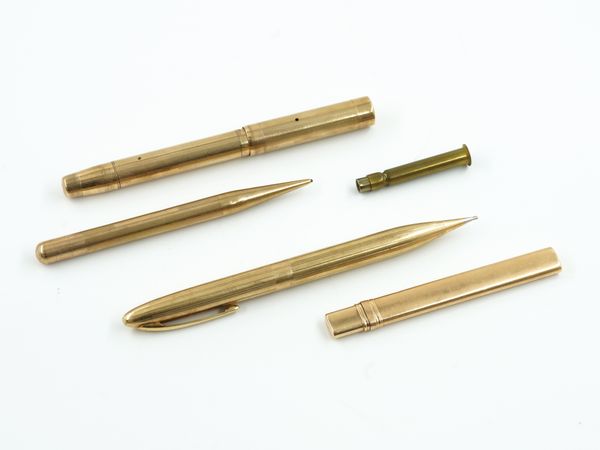 FOUR GOLD CASED WRITING IMPLEMENTS (4)