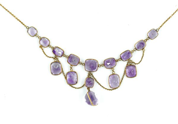 A GOLD AND AMETHYST NECKLACE