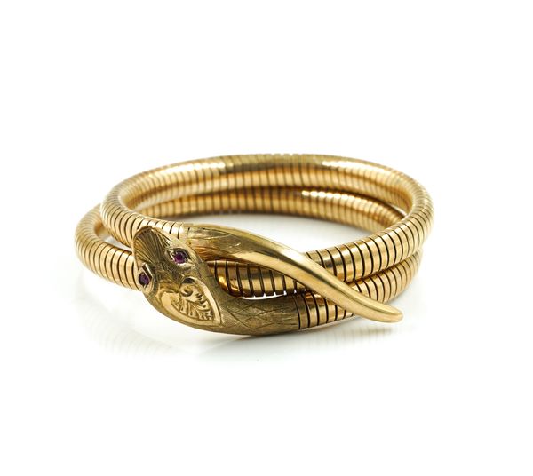 A 9CT GOLD BANGLE