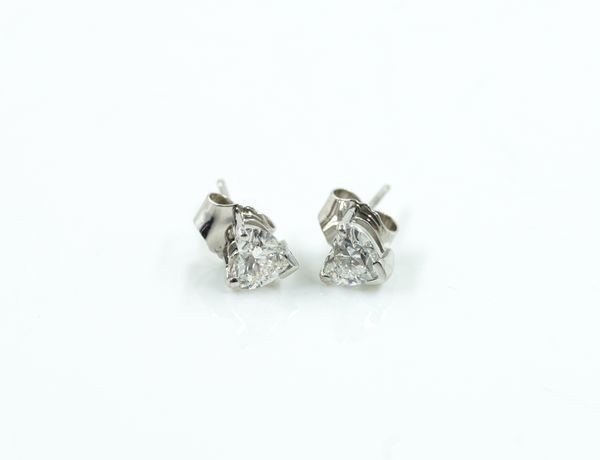 A PAIR OF HEART SHAPED DIAMOND SINGLE STONE EARSTUDS