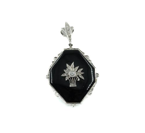 A DIAMOND AND BLACK ONYX PENDANT