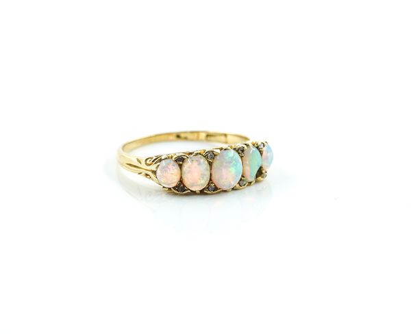 A GOLD AND OPAL FIVE STONE RING