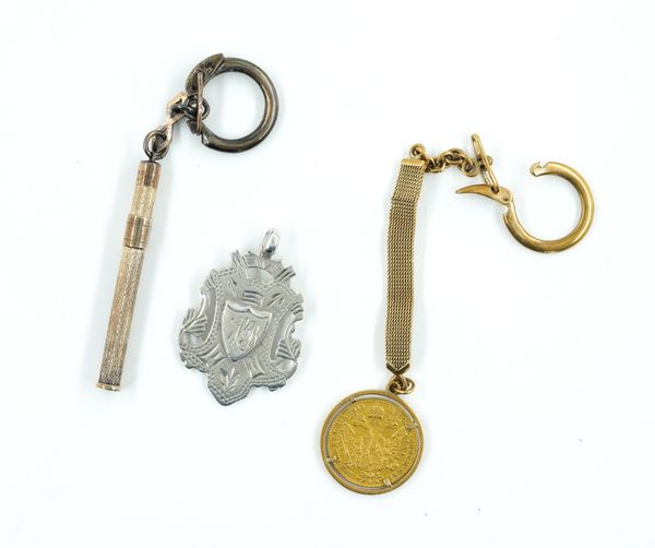 TWO KEYRINGS AND A SILVER FOB MEDAL (3)