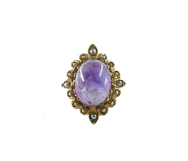 A 9CT GOLD, CABOCHON AMETHYST AND SEED PEARL RING