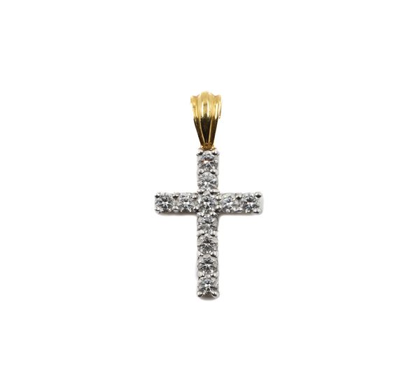 AN 18CT TWO COLOUR GOLD AND DIAMOND PENDANT CROSS