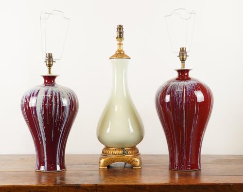 TWO CHINESE FLAMBÉ SANG DE BOEUF GLAZED BALUSTER VASE TABLE LAMPS (3)