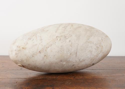 A MARBLE OVOID FORMED ABSTRACT SCULPTURE