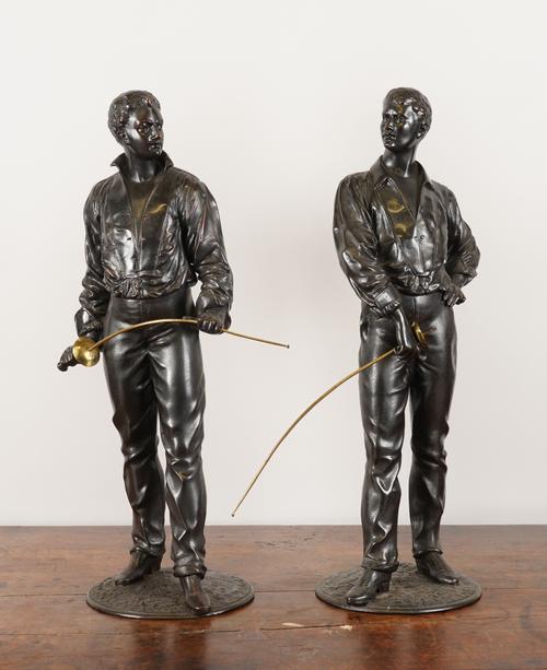 A PAIR OF FRENCH SPELTER FIGURES OF FENCERS CAST AFTER A MODEL BY RENE CHARLES MASSE (2)