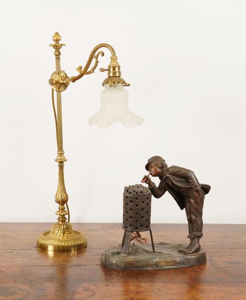 AFTER A. DE RANIERI: A FRENCH TABLE LAMP OF A BOY; TOGETHER WITH AN ADJUSTABLE LAMP (2)
