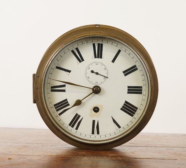 A BRASS CASED SINGLE FUSÉE WALL CLOCK