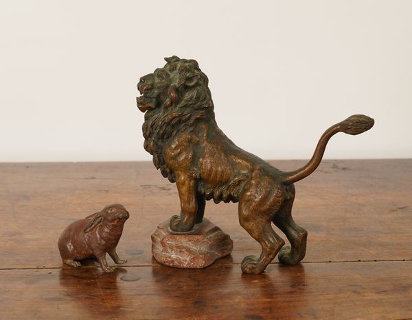 POSSIBLY FRANZ XAVER BERGMAN (AUSTRIAN, 1861-1936): A BRONZE MODEL OF A RABBIT; TOGETHER WITH A BRONZE MODEL OF A LION (2)