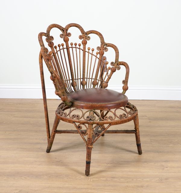 A LATE 19TH CENTURY WICKER WORK PEACOCK BACK LOW CHAIR