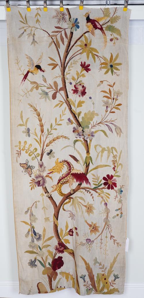 A STITCHWORK PANEL OF A DRAGON AND BIRDS IN A TREE