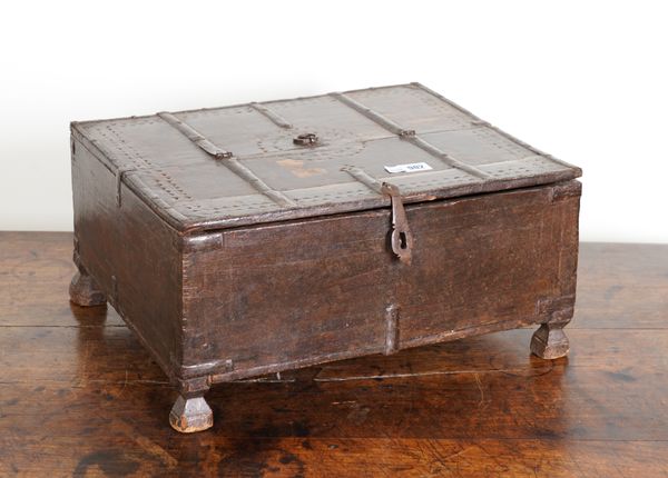 A 19TH CENTURY INDIAN IRON BOUND TEAK TABLE TOP CHEST