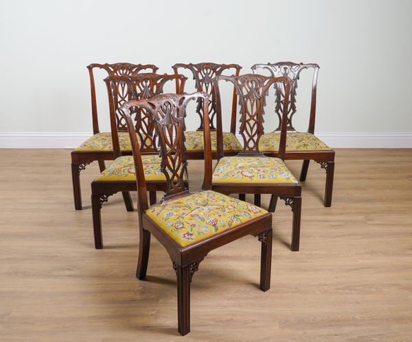 A MATCHED SET OF SIX GEORGE II CARVED MAHOGANY SPLAT BACK DINING CHAIRS (6)