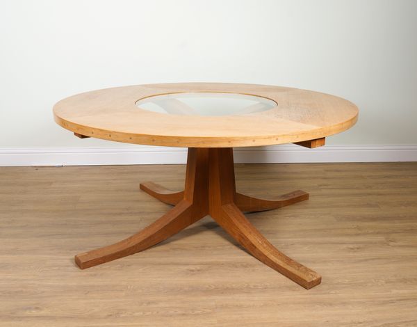 A GLASS INSET CIRCULAR OAK KITCHEN BREAKFAST TABLE