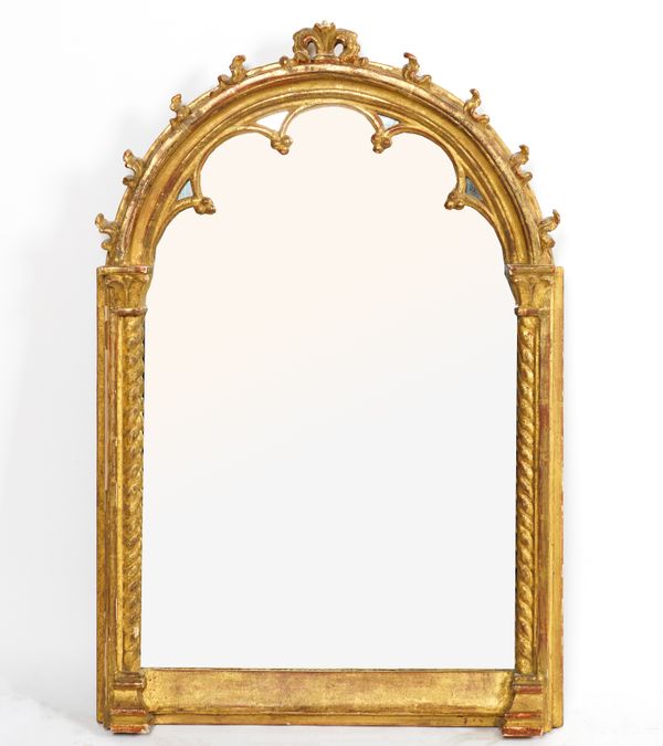 A GOTHIC STYLE GILT FRAMED ARCH TOP MIRROR