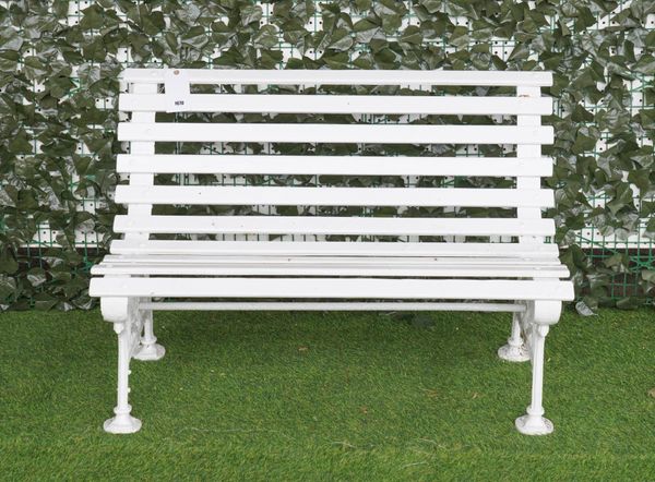 COALBROOKDALE; A 19TH CENTURY WHITE PAINTED CAST IRON GARDEN BENCH