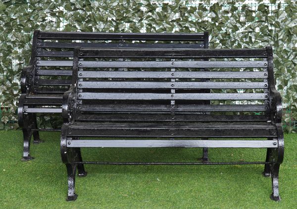 A PAIR OF BLACK PAINTED CAST METAL GARDEN BENCHES (2)