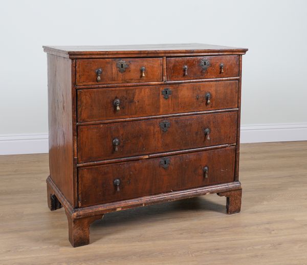 A GEORGE I WALNUT FIVE DRAWER CHEST