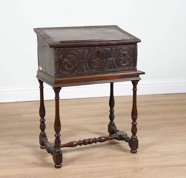 A 17TH CENTURY OAK SLOPE FRONTED BIBLE BOX