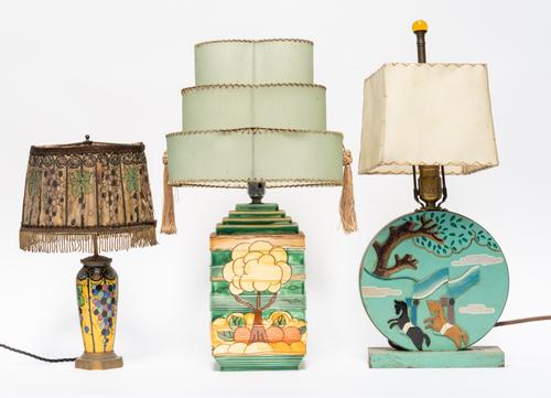 THREE TABLE LAMPS WITH SHADES INCLUDING A PAINTED RELIEF CARVED CIRCULAR LAMP (3)