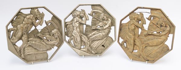THREE METAL ALLOY RELIEF CAST OCTAGONAL PANELS DEPICTING A SATYR AND A NYMPH (3)