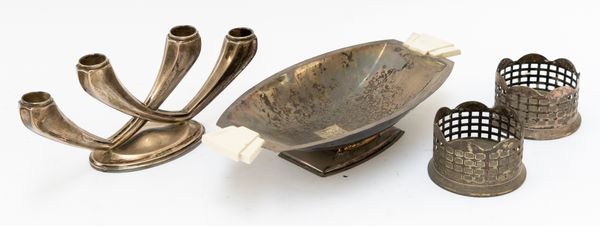 AN ART DECO STYLE SILVER-PLATED CENTRE DISH, FOUR LIGHT CANDELABRUM AND A PAIR OF WINE COASTERS (4)