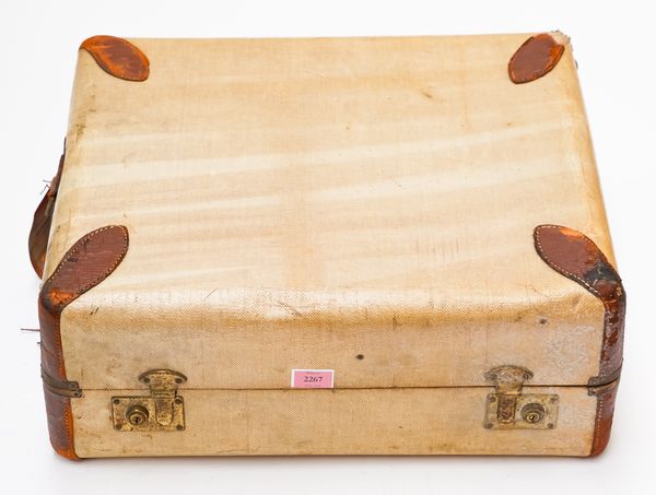 THREE EARLY 20TH CENTURY LEATHER AND CANVAS TRAVELLING CASES (3)