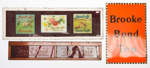 TWO FRAMED GLASS ADVERTISING SIGNS AND AN ENAMEL SIGN (3)