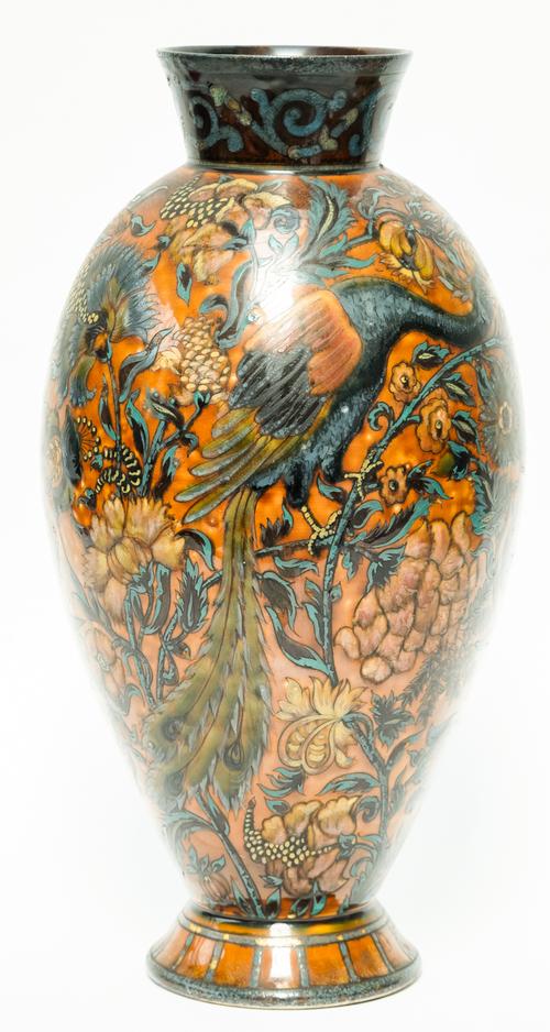 A TALL CONTINENTAL STONEWARE VASE