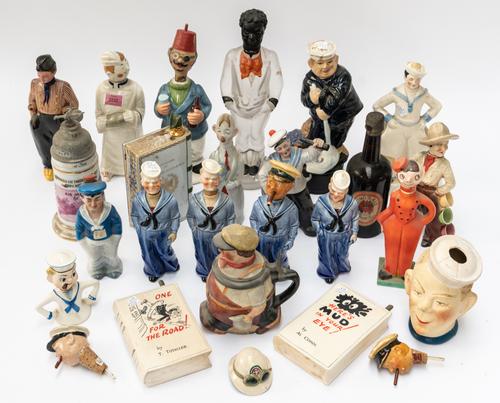 A GROUP OF FIGURAL CERAMIC DECANTERS (QTY)