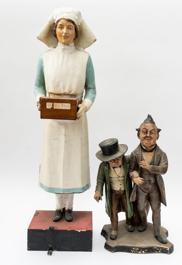 A LARGE PAPIER-MACHE CHARITY COLLECTION BOX IN THE FORM OF A NURSE (2)