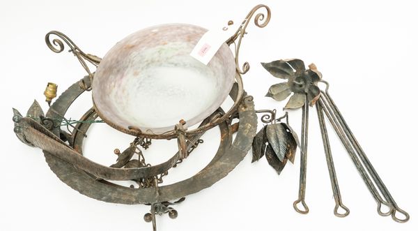 A CONTINENTAL WROUGHT-IRON MOUNTED AND MOTTLED DISHED GLASS HANGING LIGHT