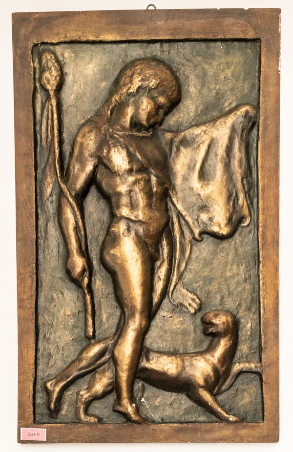 A FAUX BRONZE PLASTER PLAQUE OF TRAPEZE FORM